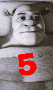 An image depicting a grayscale Shrek, appearing depressed with a Large & Red 5 on some bedsheets